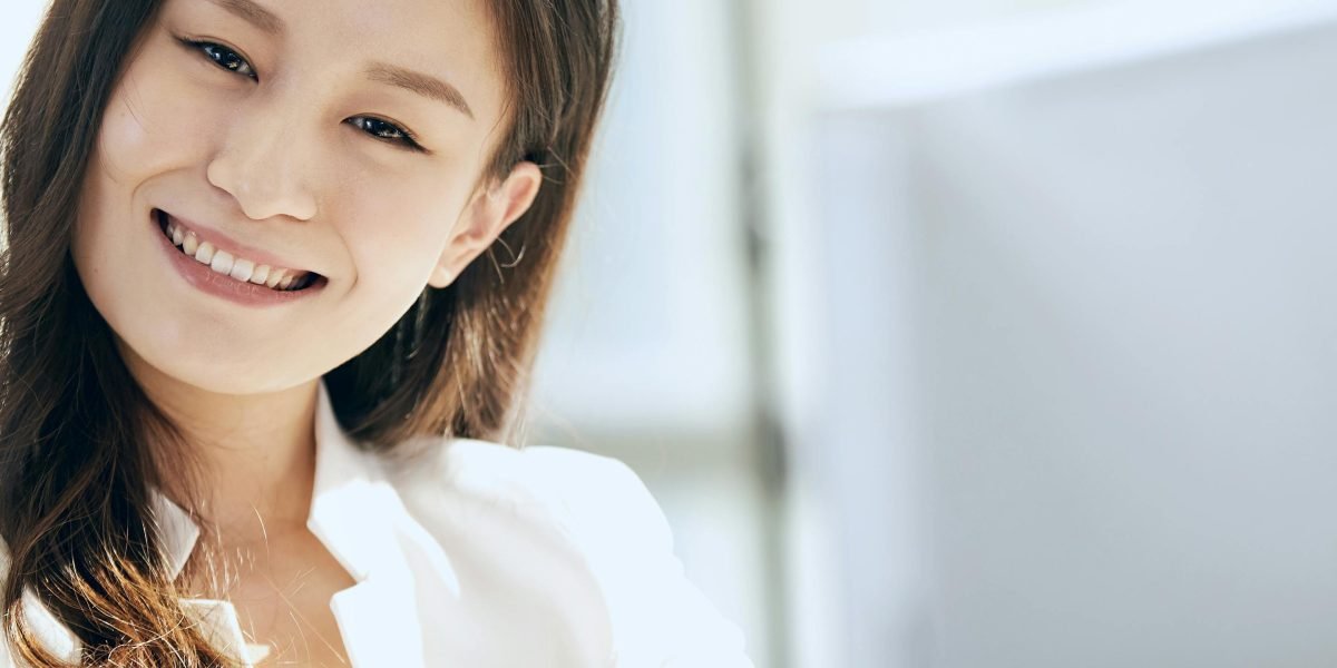 A confident professional, representing the real-world cognitive benefits derived from consistent brain training.