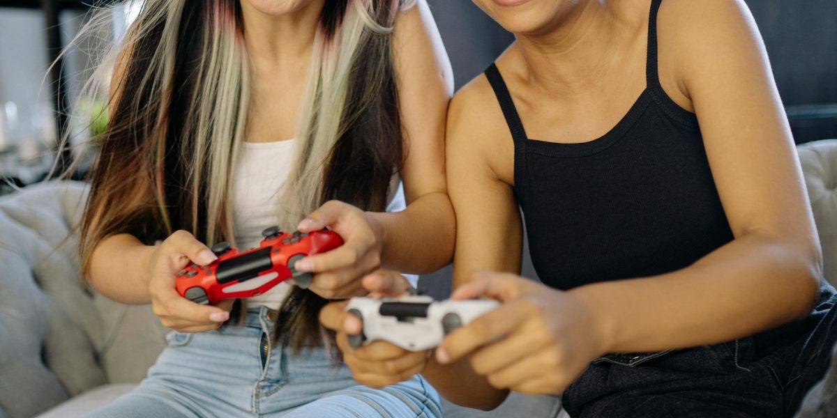 Friends gathered, laughing and enjoying a social game night together.