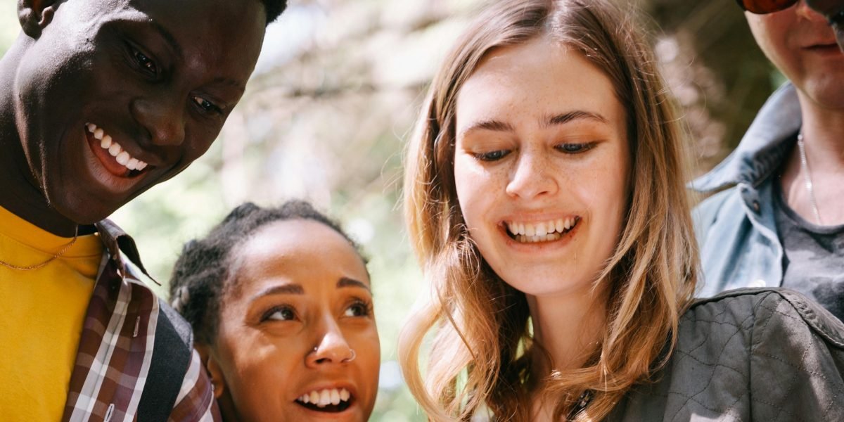 Individuals enjoying a cooperative activity, fostering teamwork and social interaction.