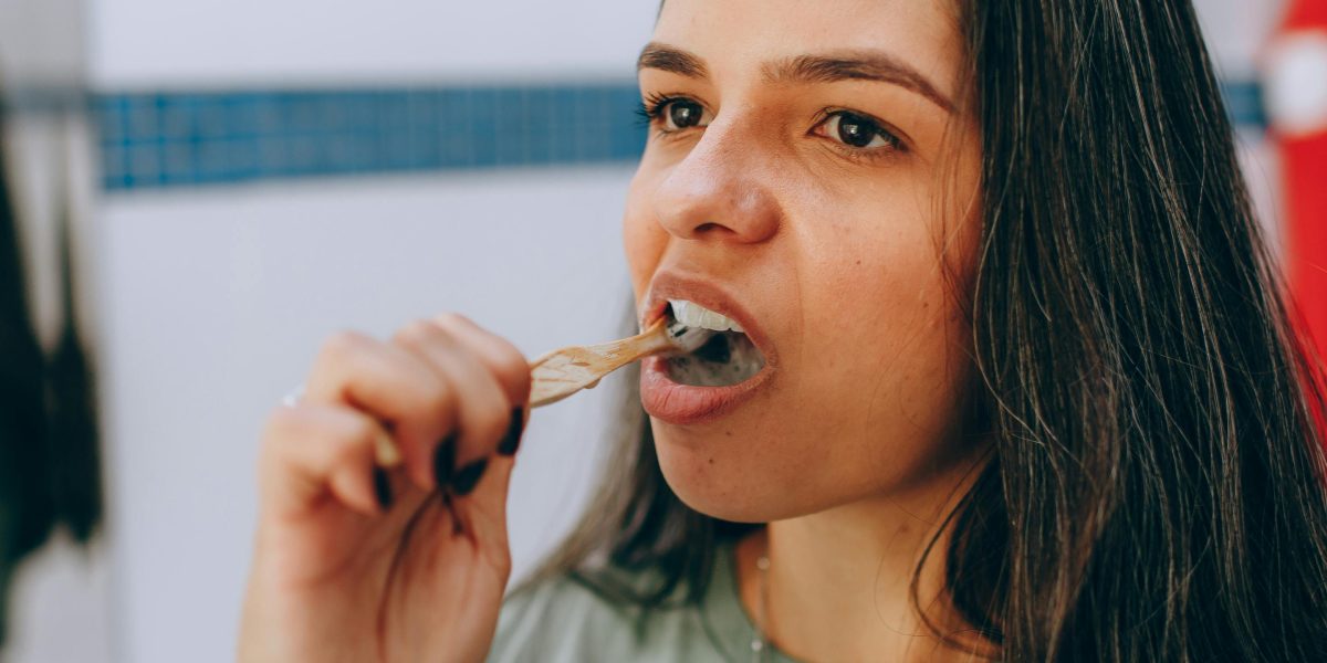 A person calmly engaging in a consistent daily activity, symbolizing the importance of routine for cognitive training.