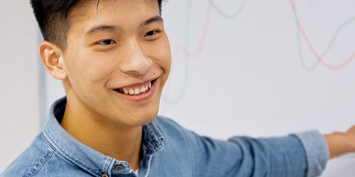 A person experiencing positive motivation and satisfaction from tracking personal progress in a learning game.