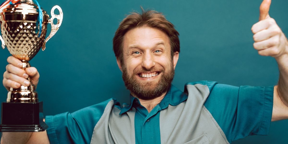 A person looking confident and satisfied, representing the positive outcome and sense of achievement from consistent cognitive training and improved mental skills.