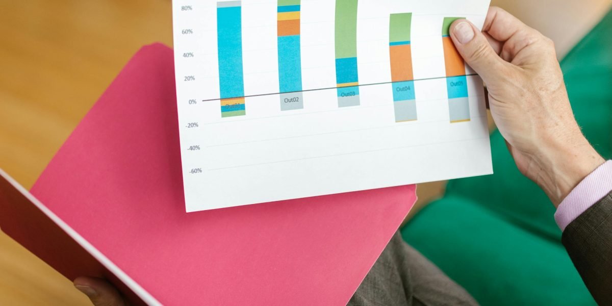 Someone reviewing data or charts, symbolizing the tracking of cognitive improvements over time.