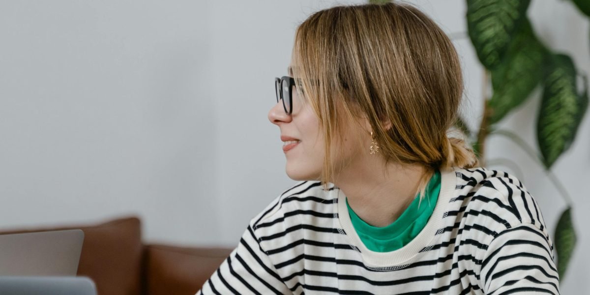 A person deeply focused, engaging with educational content, illustrating the natural learning process.