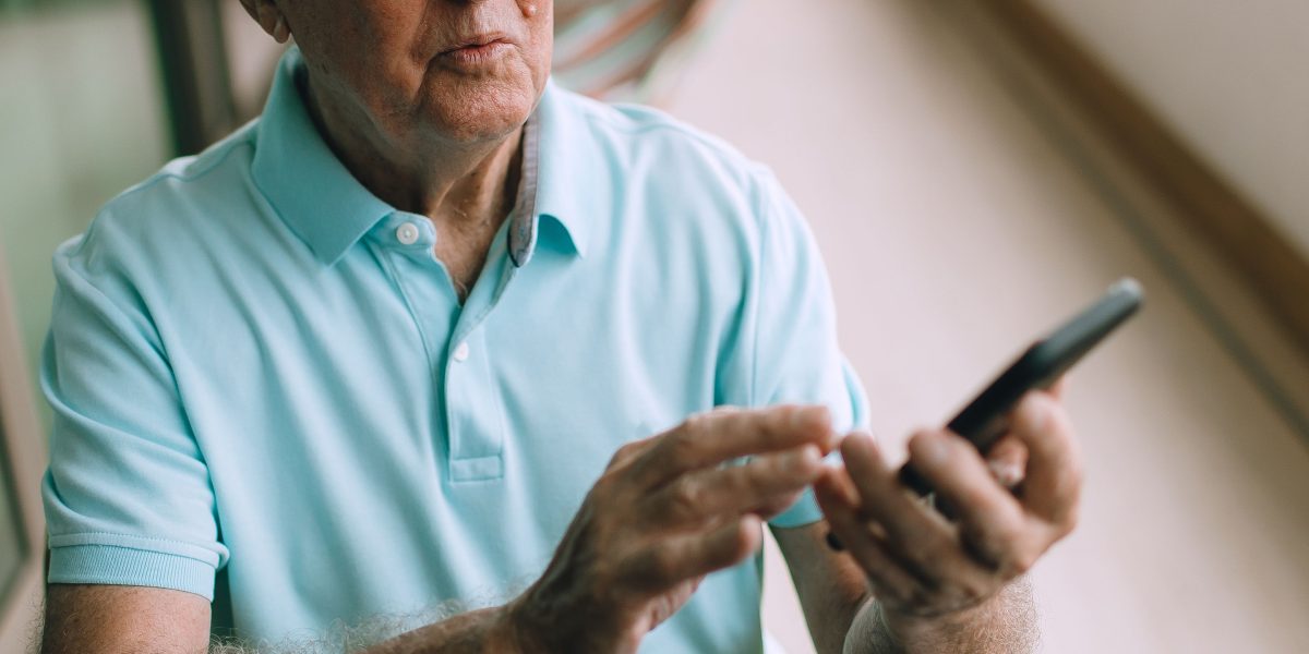 An older adult engaged in an activity that promotes mental stimulation and cognitive health.