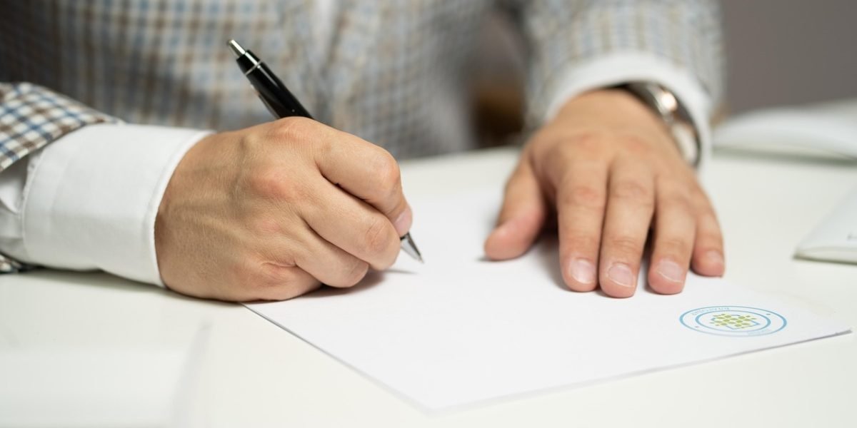 An individual calmly and patiently reviewing documents, embodying the delayed gratification and careful planning taught by incremental games.