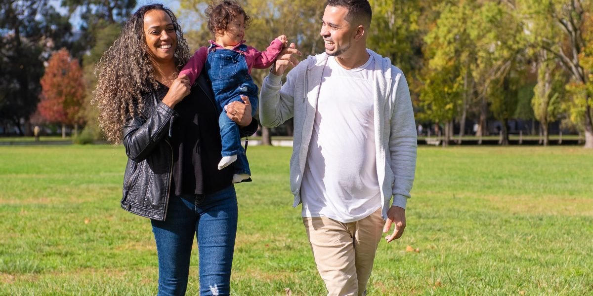 A family enjoying a variety of activities, balancing screen time with real-world play.