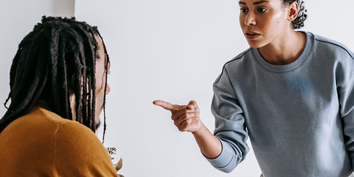 A person confidently articulating their thoughts, conveying a sense of clarity and understanding in a discussion.