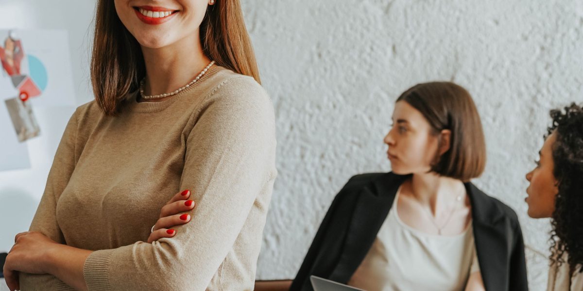 A person confidently speaking or presenting, demonstrating active recall in action during a practice session.