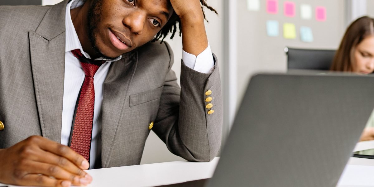 A person managing multiple commitments, representing the challenge of information overload that calendar apps help alleviate.