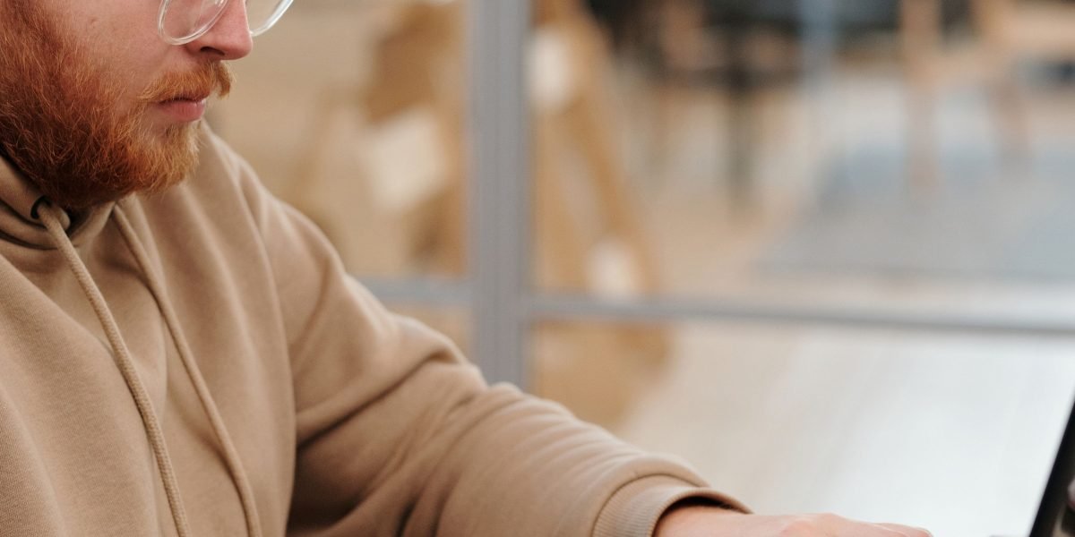 A person deeply focused on a task, highlighting the benefits of minimizing digital distractions for concentration.