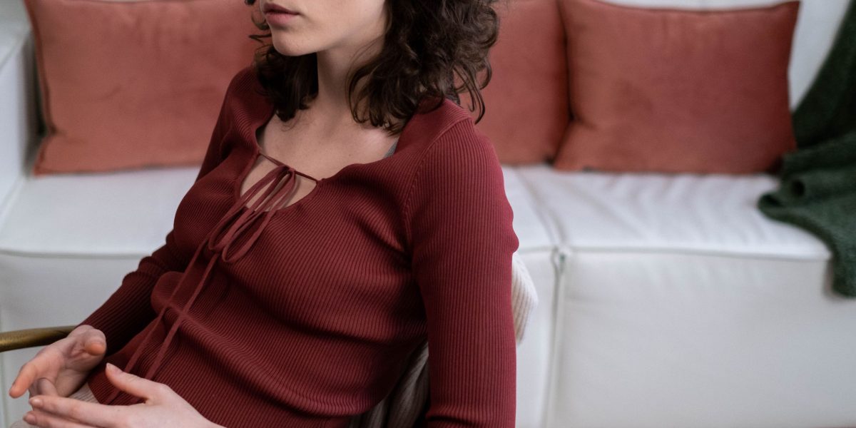 Individuals actively listening and engaging in a supportive conversation.