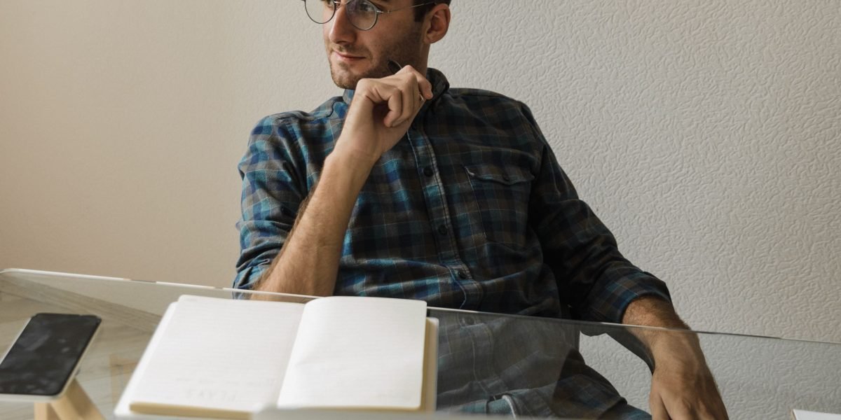 A person deep in thought, reflecting on different ways of thinking and learning.